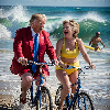 Thumbnail Donald Trump And Hillary Clinton Riding Bikes On The Beach
